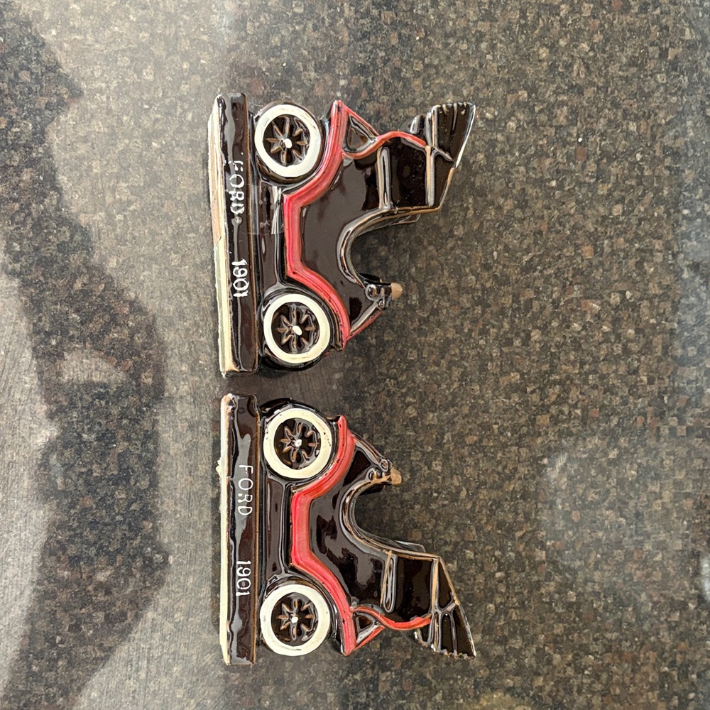 Vintage Ford 1901 car bookends/pen holders.